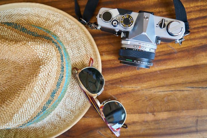 Carry-On Packing List for Digital Nomads Sunglasses, hat and camera