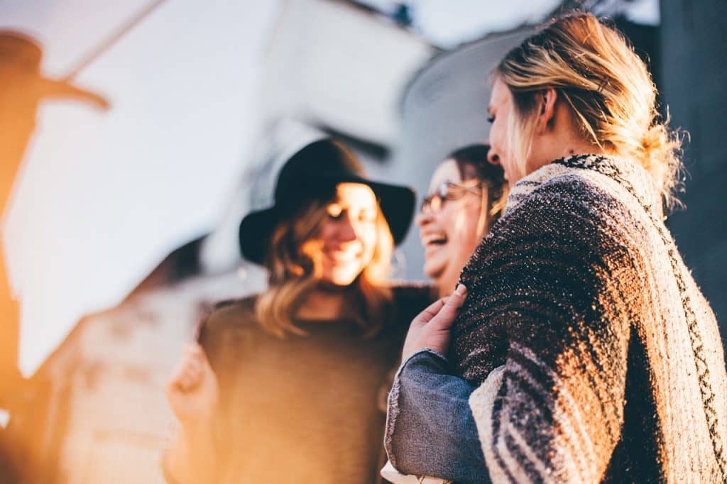 three girls laughing
